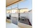 Screened patio with paver stones and small table and chairs at 659 Fortanini Cir, Ocoee, FL 34761