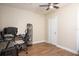 A versatile room set up as a home office with a desk, chair, and computer at 111 Windy Dune Ct, Kissimmee, FL 34743