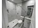 Clean bathroom with marble-look shower and granite vanity at 1170 S Central Ave, Apopka, FL 32703