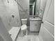 Bathroom with shower, toilet and granite vanity at 1170 S Central Ave, Apopka, FL 32703