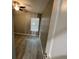 Bright bedroom with ceiling fan and vinyl flooring at 1170 S Central Ave, Apopka, FL 32703