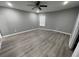 Spacious bedroom featuring wood-look floors at 1170 S Central Ave, Apopka, FL 32703