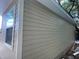 Tan house exterior with window and siding at 1170 S Central Ave, Apopka, FL 32703