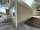 Tan house exterior with white trim and window at 1170 S Central Ave, Apopka, FL 32703