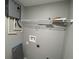 Small laundry room with shelving and plumbing fixtures at 1170 S Central Ave, Apopka, FL 32703