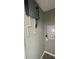 Utility closet with water heater and electrical panel at 1170 S Central Ave, Apopka, FL 32703