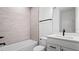 Bathroom with soaking tub and modern vanity at 15142 Grove Lake Dr, Winter Garden, FL 34787