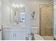 Clean bathroom with white vanity and shower at 159 Golden Noble St, Kissimmee, FL 34747