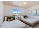 Bedroom with two twin-size beds and patterned ceiling at 159 Golden Noble St, Kissimmee, FL 34747