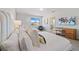 Bright bedroom with a queen bed and a view at 159 Golden Noble St, Kissimmee, FL 34747