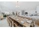 Large dining room with seating for many guests at 159 Golden Noble St, Kissimmee, FL 34747