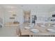 Bright dining room with view into kitchen and Gathering area at 159 Golden Noble St, Kissimmee, FL 34747