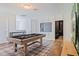 Game room features a pool table and media area at 159 Golden Noble St, Kissimmee, FL 34747