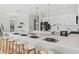 Modern kitchen with breakfast bar and white cabinets at 159 Golden Noble St, Kissimmee, FL 34747