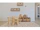 Adorable play area with table, chairs, and storage at 159 Golden Noble St, Kissimmee, FL 34747