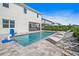 Stunning pool with a spa, lounge chairs, and a basketball hoop at 159 Golden Noble St, Kissimmee, FL 34747
