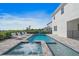 Luxury pool and spa with lounge chairs, creating a relaxing backyard retreat at 159 Golden Noble St, Kissimmee, FL 34747