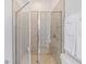 Clean bathroom with a large shower and tiled walls at 159 Golden Noble St, Kissimmee, FL 34747