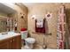 Accessible bathroom with tiled walls and shower at 1812 Hudson Ct, Kissimmee, FL 34759