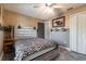 Bedroom with a zebra-print comforter and ceiling fan at 1812 Hudson Ct, Kissimmee, FL 34759
