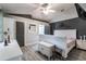 Primary bedroom with gray walls and a white sleigh bed at 1812 Hudson Ct, Kissimmee, FL 34759