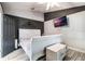 Spacious bedroom with gray walls and a white sleigh bed at 1812 Hudson Ct, Kissimmee, FL 34759