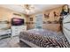 Bedroom with a zebra-print comforter and ceiling fan at 1812 Hudson Ct, Kissimmee, FL 34759
