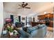 Open concept kitchen with an island, stainless steel appliances, and wood cabinets at 1812 Hudson Ct, Kissimmee, FL 34759