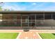 Screened porch with access to backyard and patio at 1812 Hudson Ct, Kissimmee, FL 34759