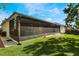Large screened porch with access to the backyard at 1812 Hudson Ct, Kissimmee, FL 34759