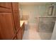 Updated bathroom with walk-in shower and soaking tub at 306 Wild Olive Ln, Longwood, FL 32779