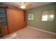 Guest bedroom with built-in Murphy bed and shelving at 306 Wild Olive Ln, Longwood, FL 32779