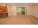 Living room with sliding glass doors leading to a patio at 306 Wild Olive Ln, Longwood, FL 32779