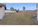 Large backyard with a partially fenced area at 317 Florida Pkwy, Kissimmee, FL 34743