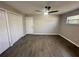 Bright bedroom with tile floors and double doors leading to a large closet at 3522 E Kaley Ave, Orlando, FL 32806