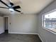 Bright bedroom with tile floors, ceiling fan, and pool view at 3522 E Kaley Ave, Orlando, FL 32806