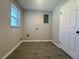 Laundry room with tile floors and a window at 3522 E Kaley Ave, Orlando, FL 32806