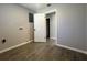 Laundry room with tile floors and a door at 3522 E Kaley Ave, Orlando, FL 32806