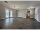 Open living room with tile floors and access to other rooms at 3522 E Kaley Ave, Orlando, FL 32806