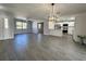 Open-concept living room and kitchen with tile flooring at 3522 E Kaley Ave, Orlando, FL 32806