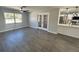 Living room with tile flooring and French doors at 3522 E Kaley Ave, Orlando, FL 32806