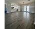 Spacious living room with tile flooring and access to the kitchen at 3522 E Kaley Ave, Orlando, FL 32806