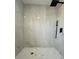 Large walk-in shower with marble tile and modern fixtures at 3522 E Kaley Ave, Orlando, FL 32806