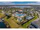 Aerial view of resort-style pool and lake at 4721 Clock Tower Dr # 204, Kissimmee, FL 34746