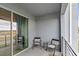 Relaxing balcony with outdoor seating and scenic views at 4721 Clock Tower Dr # 204, Kissimmee, FL 34746