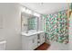 Bathroom with double vanity and shower/tub combo at 4721 Clock Tower Dr # 204, Kissimmee, FL 34746