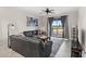 Spacious living room with comfortable seating and access to a balcony at 4721 Clock Tower Dr # 204, Kissimmee, FL 34746