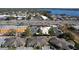 Aerial showing complex near a lake and main road at 505 Polaris Loop # 107, Casselberry, FL 32707