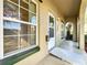Front door entrance with ramp and arched entryway at 505 Polaris Loop # 107, Casselberry, FL 32707