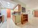 Kitchen with light wood cabinets, granite counters, and tile backsplash at 505 Polaris Loop # 107, Casselberry, FL 32707